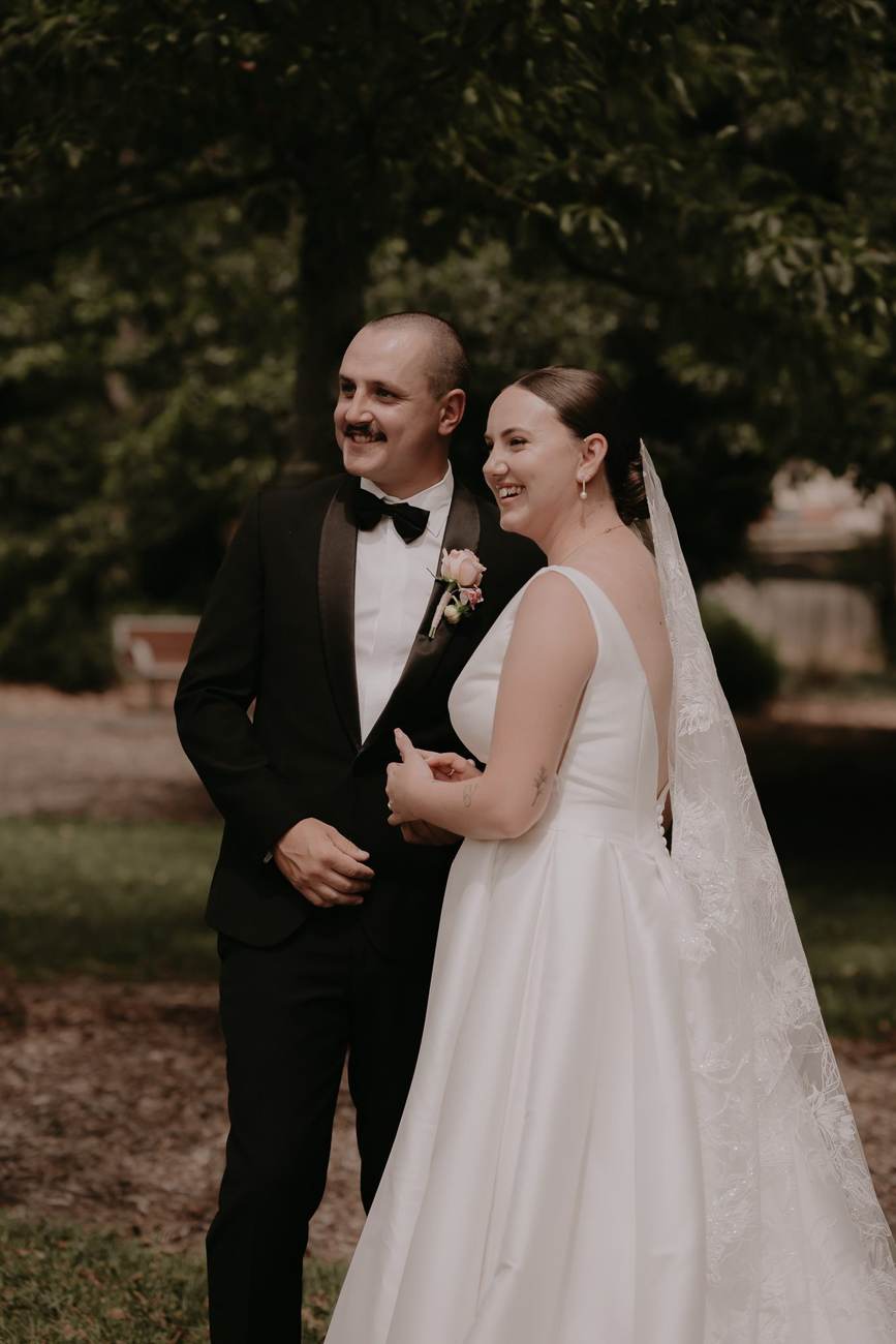 Alicia and Jayden smiling on their wedding day in Melbourne