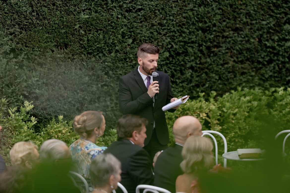Outdoor wedding ceremony with John Edney Melbourne marriage celebrant John Edney leading an outdoor garden wedding ceremony