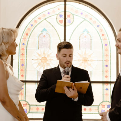 John Officiating Wedding With Couple